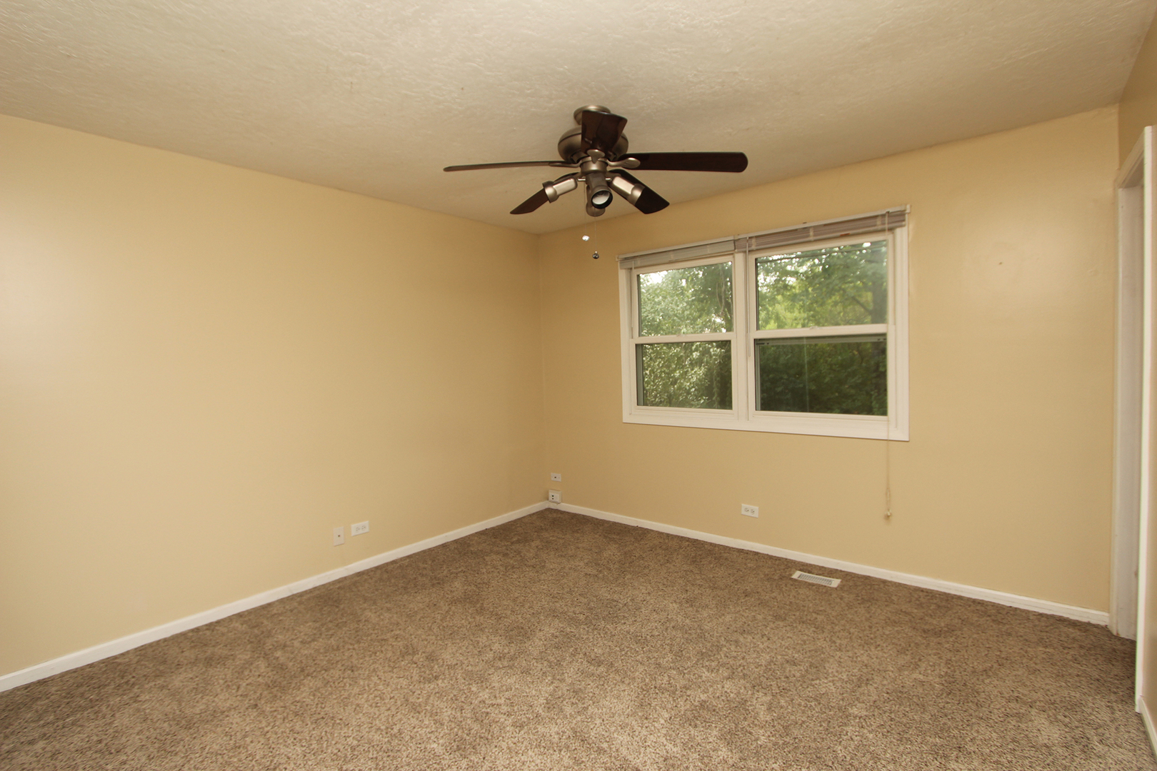 65 Old Mill Grove Road Lake Zurich, IL 60047 - Photo 16 of 29 an empty room with a window