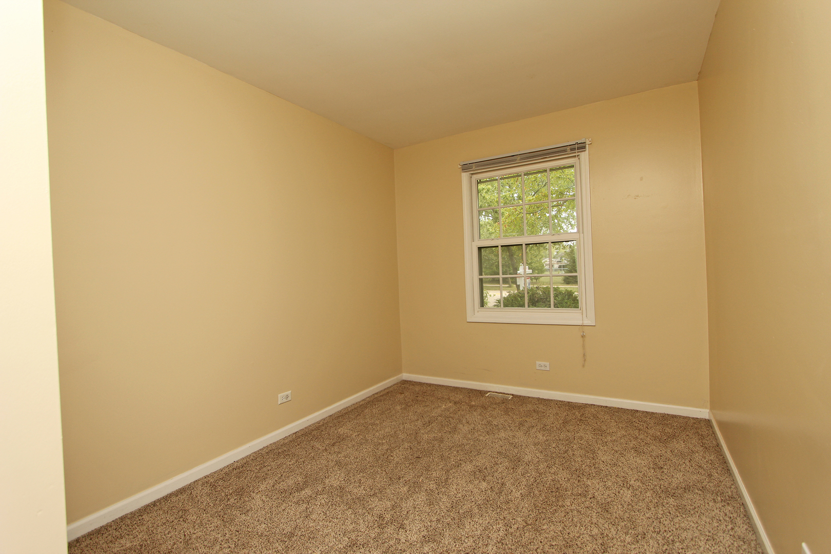65 Old Mill Grove Road Lake Zurich, IL 60047 - Photo 20 of 29 a view of an empty room with a window
