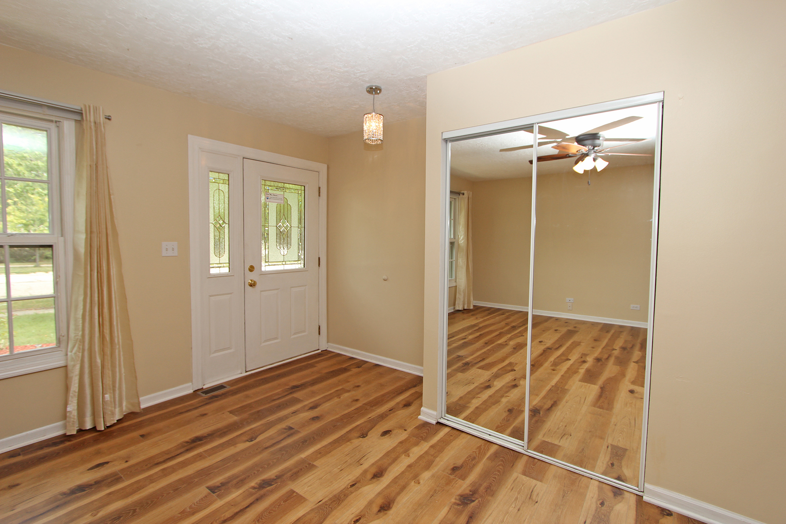 65 Old Mill Grove Road Lake Zurich, IL 60047 - Photo 2 of 29 a view of an empty room