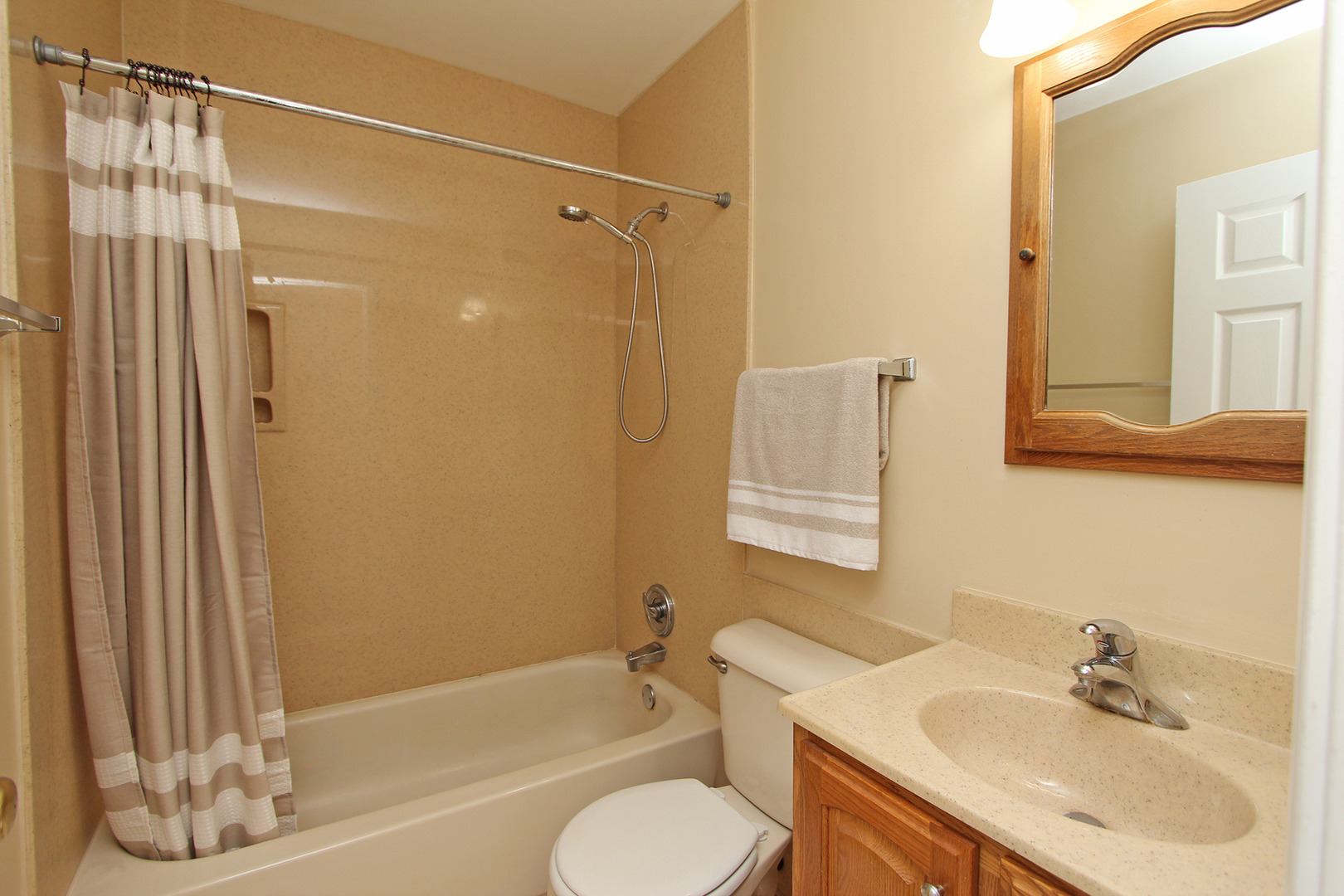 65 Old Mill Grove Road Lake Zurich, IL 60047 - Photo 24 of 29 a bathroom with a sink toilet and shower