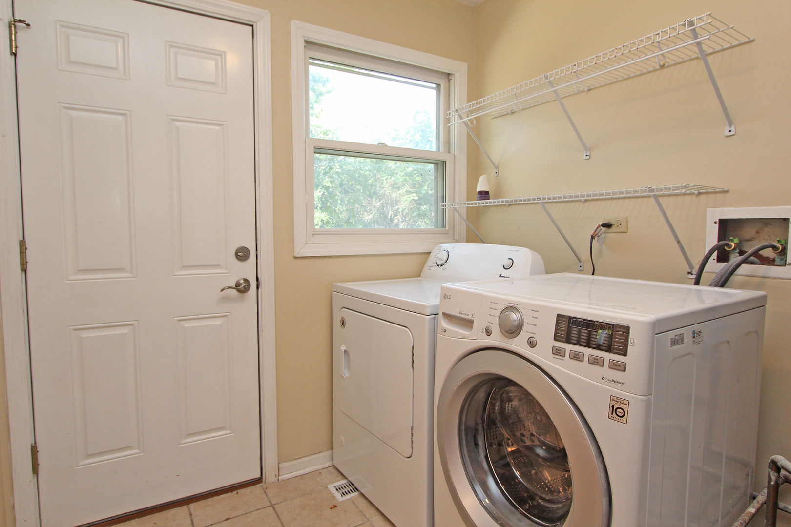 65 Old Mill Grove Road Lake Zurich, IL 60047 - Photo 25 of 29 a utility room with dryer and washer