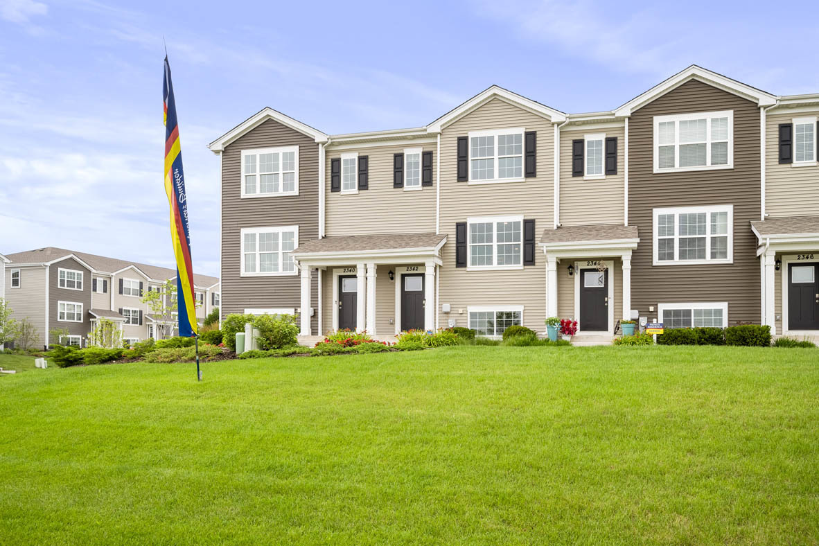 3728 Bailey Road Yorkville, IL 60560 - Photo 1 of 16 a front view of a house with a yard