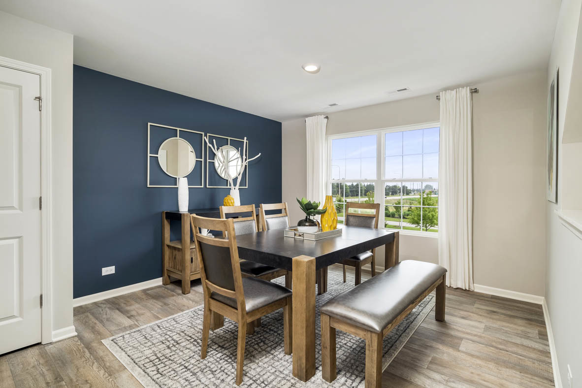 3728 Bailey Road Yorkville, IL 60560 - Photo 6 of 16 a view of a dining room with furniture window and wooden floor