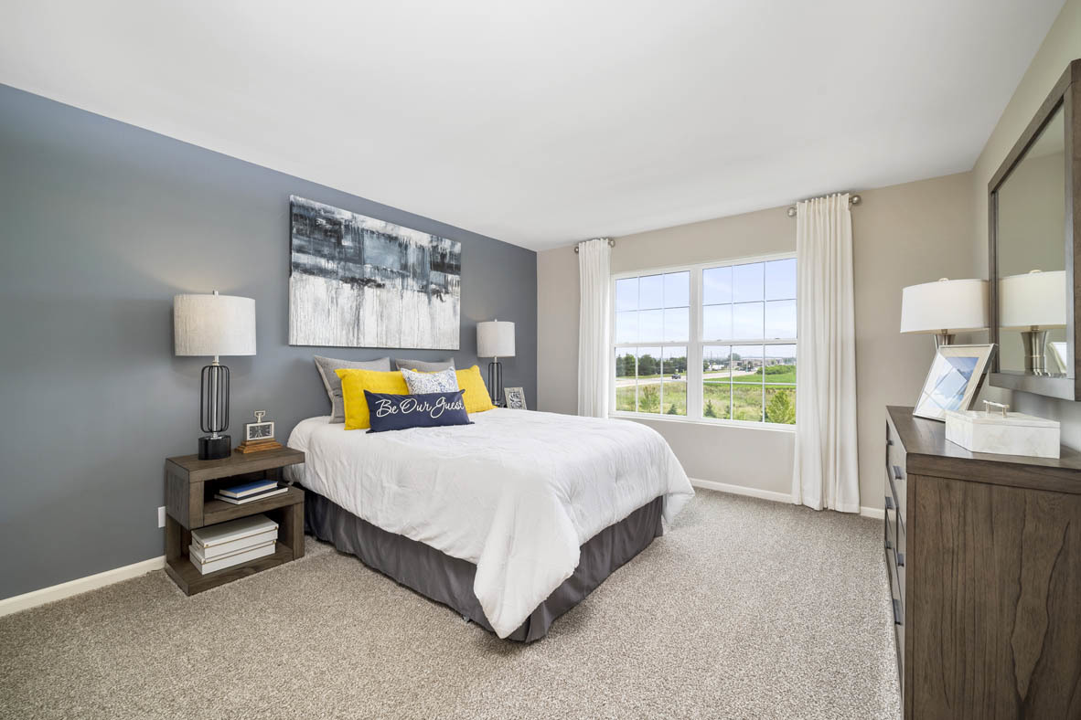 3728 Bailey Road Yorkville, IL 60560 - Photo 10 of 16 a spacious bedroom with a bed and window