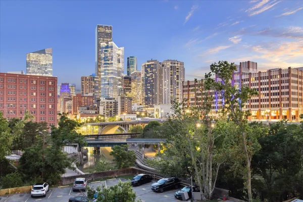 a view of a city with tall buildings