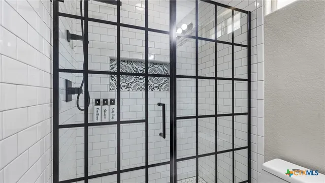 a view of staircase with a window