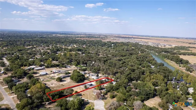 an aerial view of residential building with city view