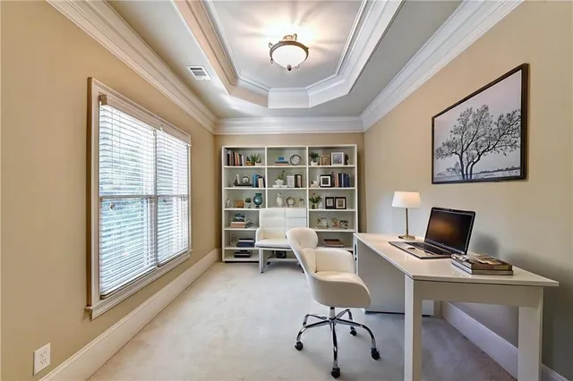 a spacious bathroom with a double vanity sink a large mirror and a bathtub next to a window