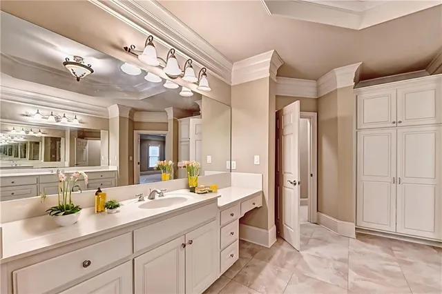 a view of a room with wooden walls and furniture