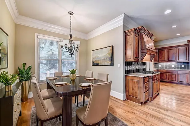 a kitchen with granite countertop lots of counter top space and living room