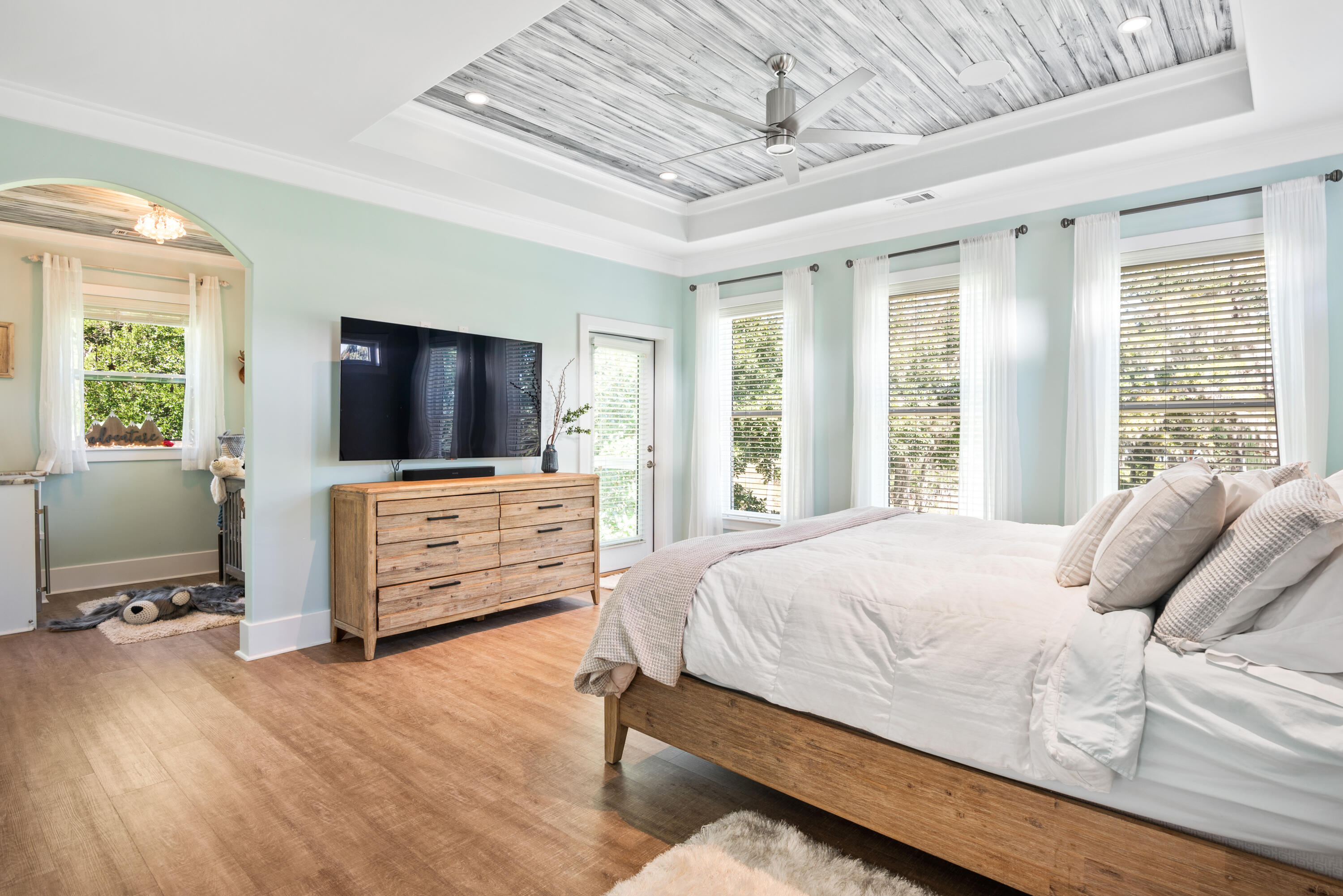 160 Rearden Way Santa Rosa Beach, FL 32459 - Photo 22 of 46 a bedroom with furniture and flat screen tv