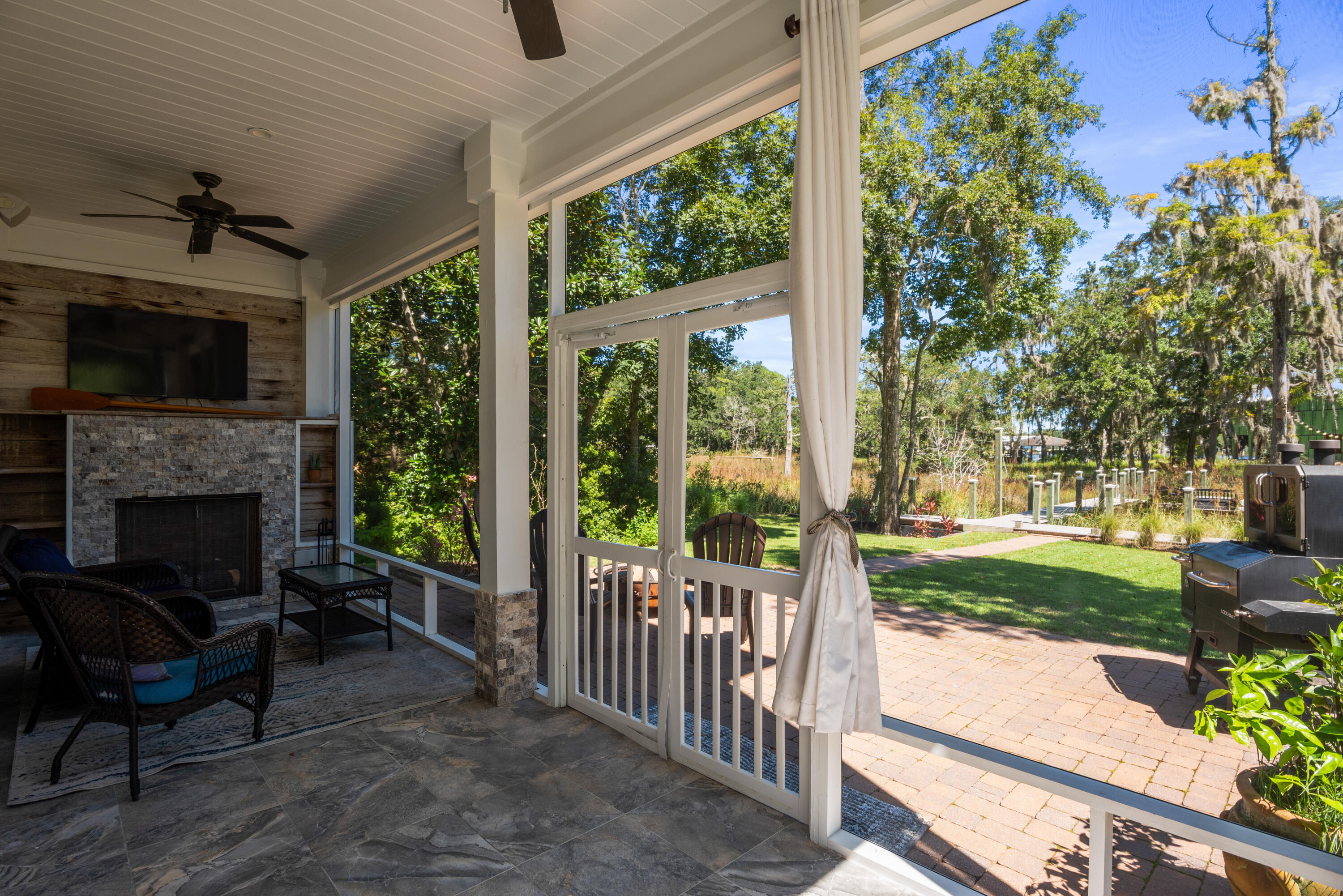 160 Rearden Way Santa Rosa Beach, FL 32459 - Photo 32 of 46 a view of a porch with furniture and garden