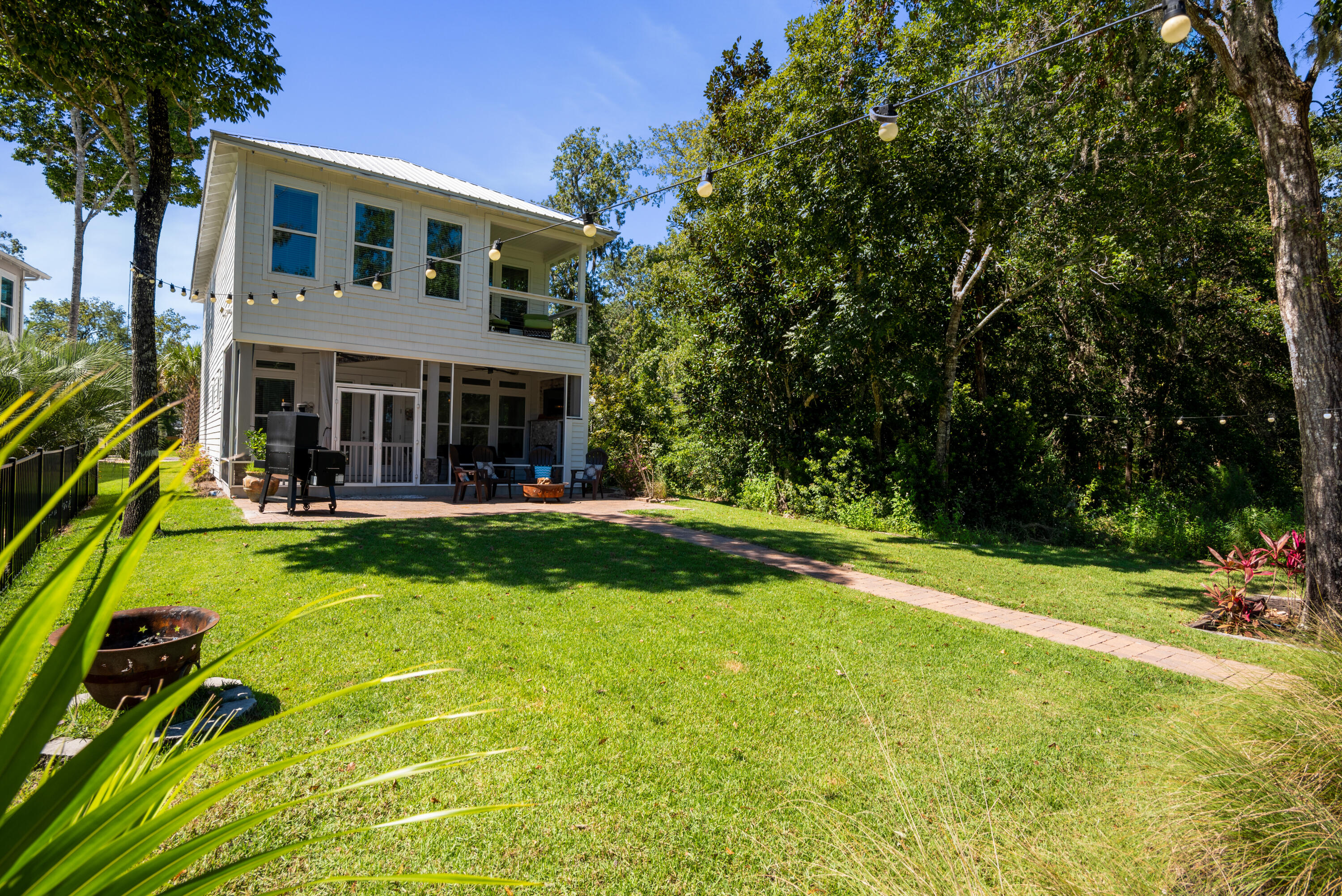 160 Rearden Way Santa Rosa Beach, FL 32459 - Photo 33 of 46 a view of a house with a yard patio and swimming pool