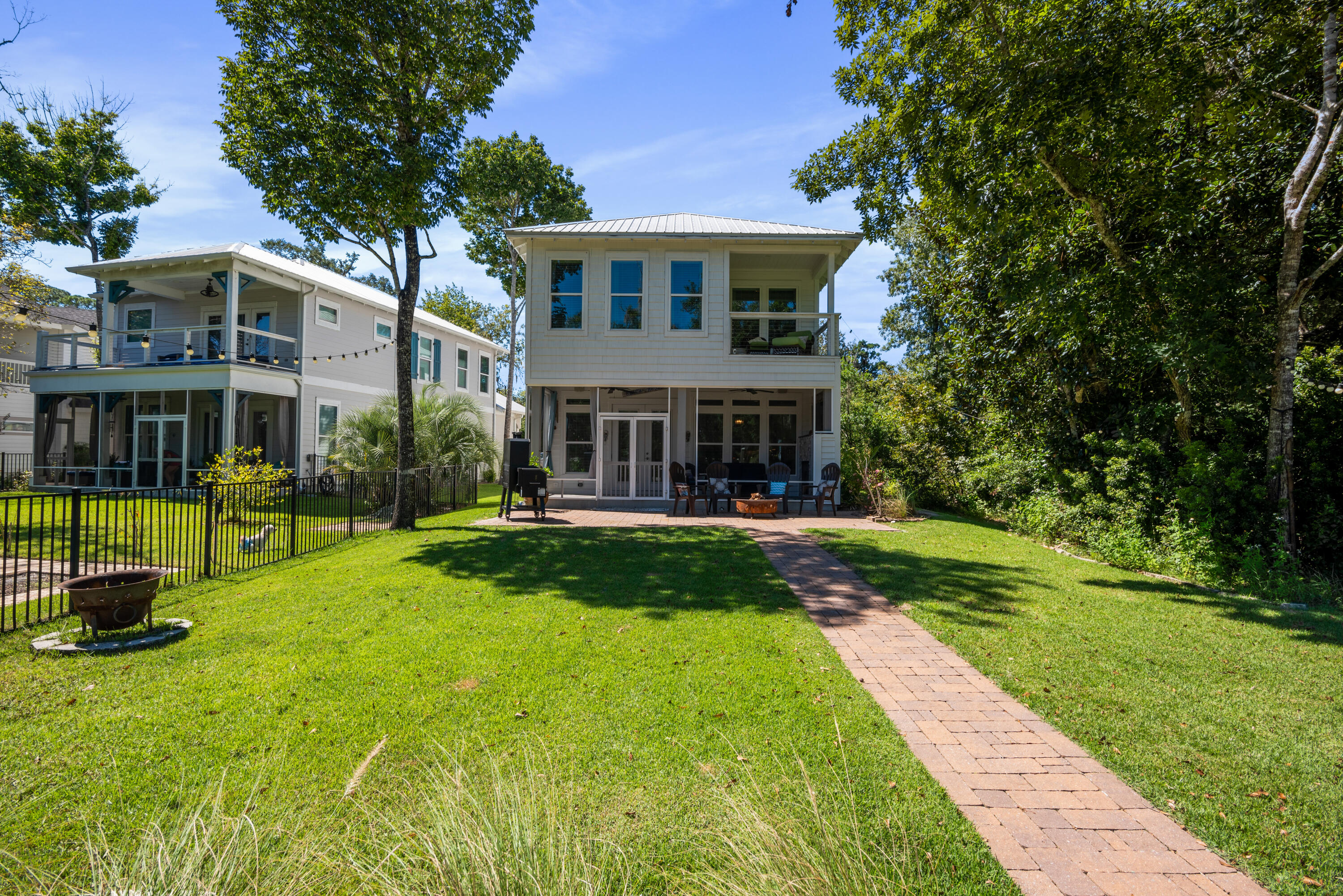 160 Rearden Way Santa Rosa Beach, FL 32459 - Photo 34 of 46 a view of a house with a yard porch and sitting area