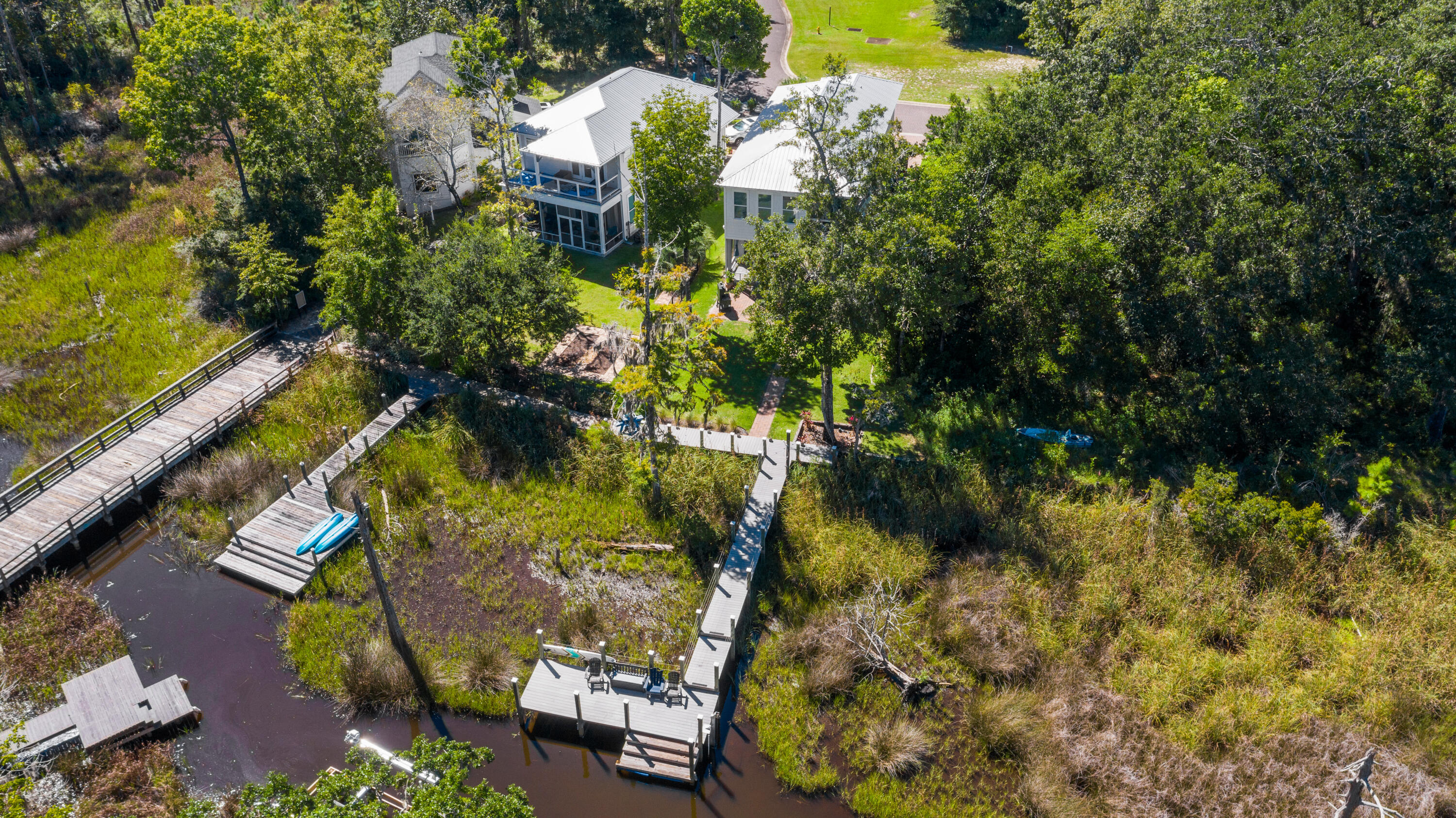 160 Rearden Way Santa Rosa Beach, FL 32459 - Photo 42 of 46 a backyard of a house with lots of green space