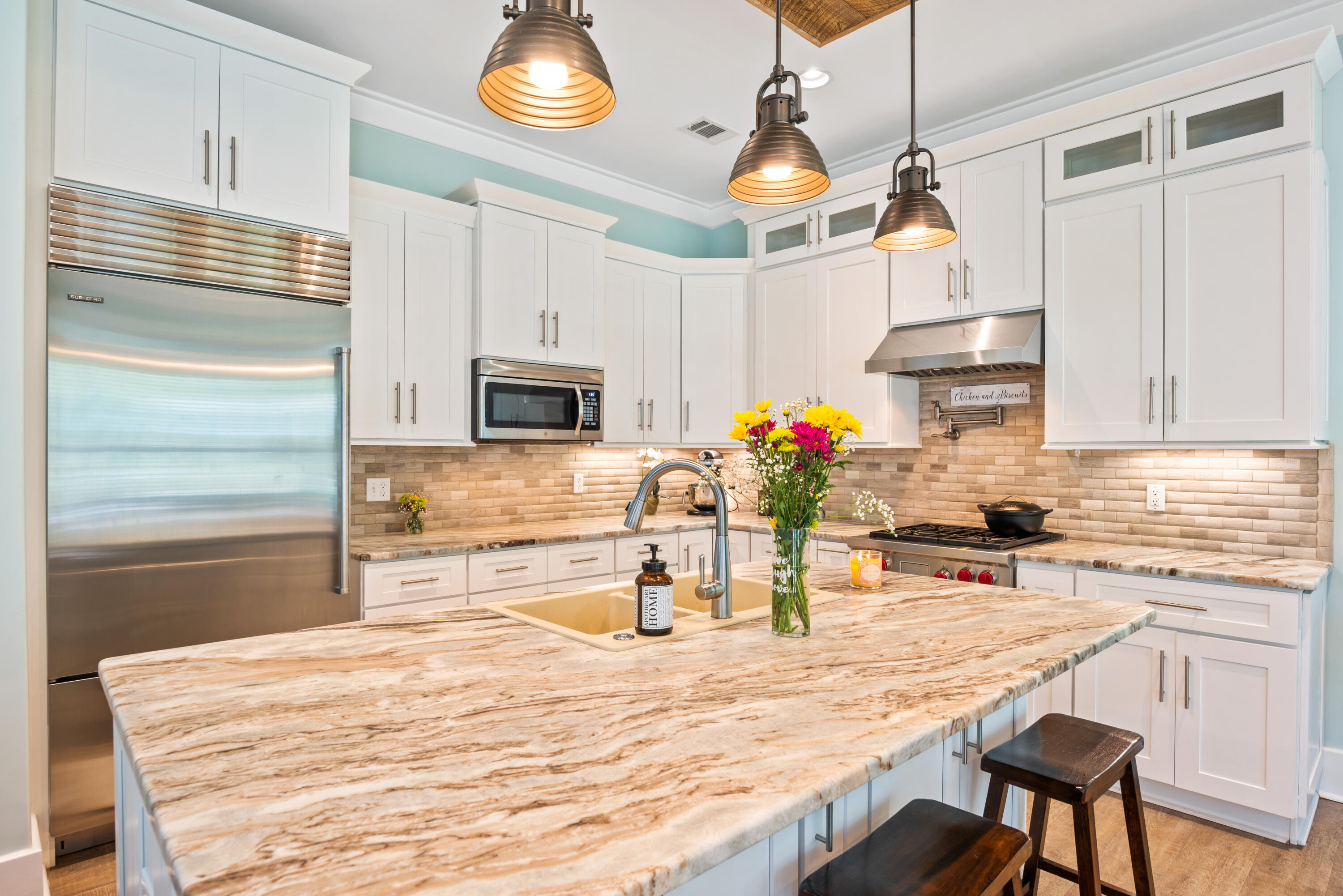 160 Rearden Way Santa Rosa Beach, FL 32459 - Photo 10 of 46 a kitchen with stainless steel appliances granite countertop a sink and cabinets