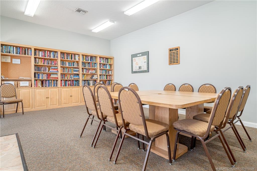 1313 Southwest Balmoral Trace Stuart, FL 34997 - Photo 44 of 70 Library, meeting room for games
