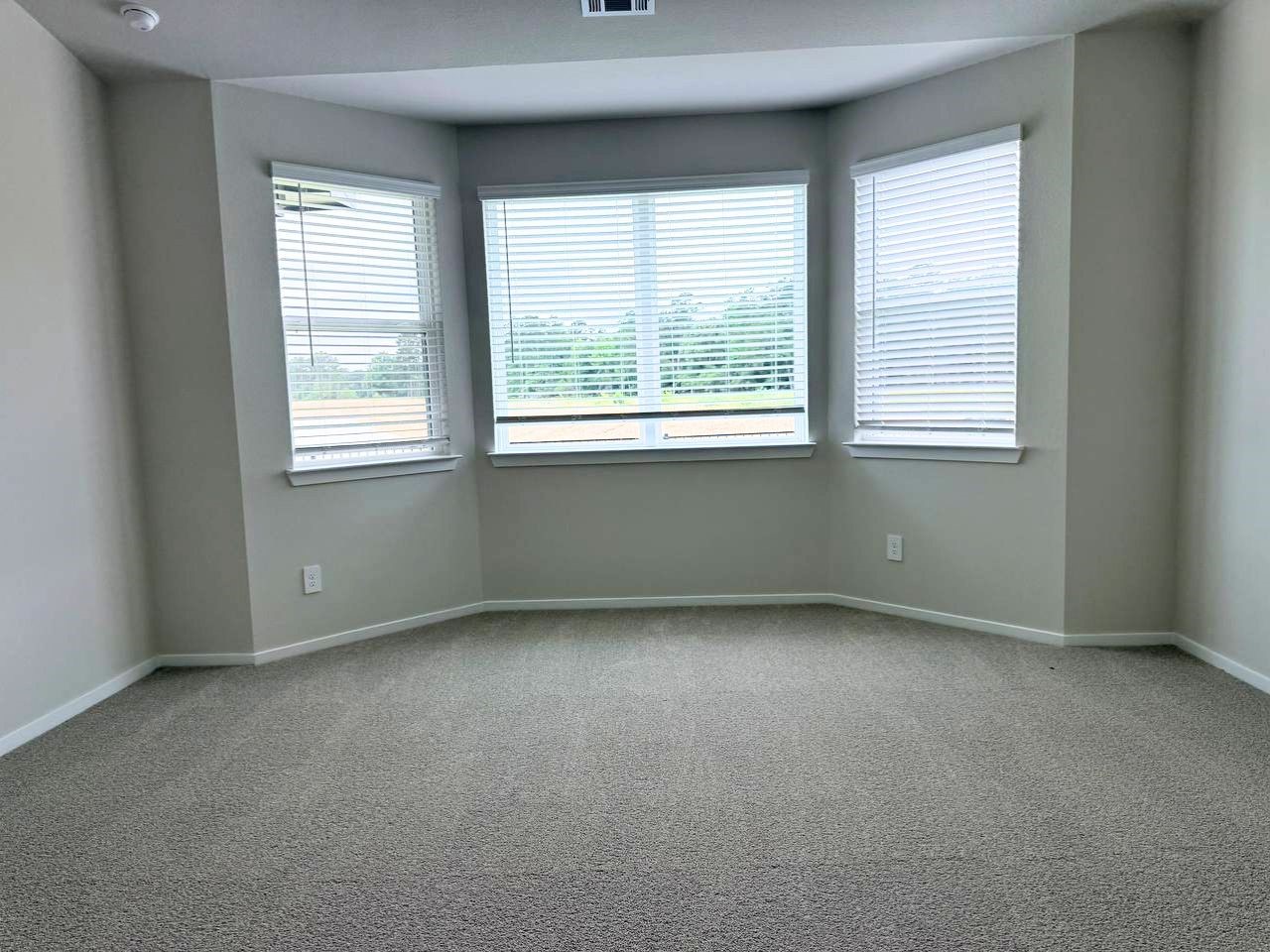 16246 Parish Pointe Court Conroe, TX 77302 - Photo 20 of 32 an empty room with a window
