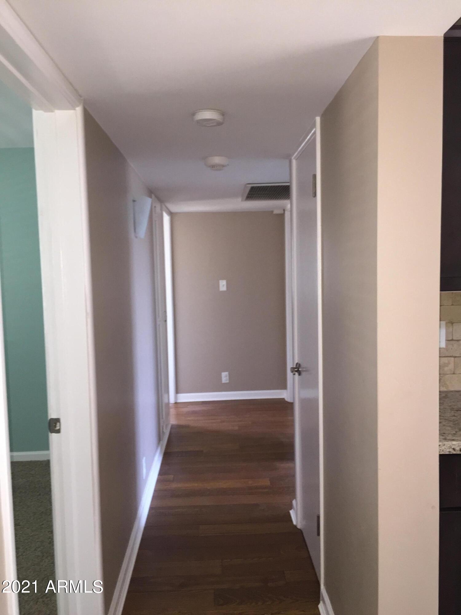 4229 North 34th Street Phoenix, AZ 85018 - Photo 13 of 23 hallway to bedrooms