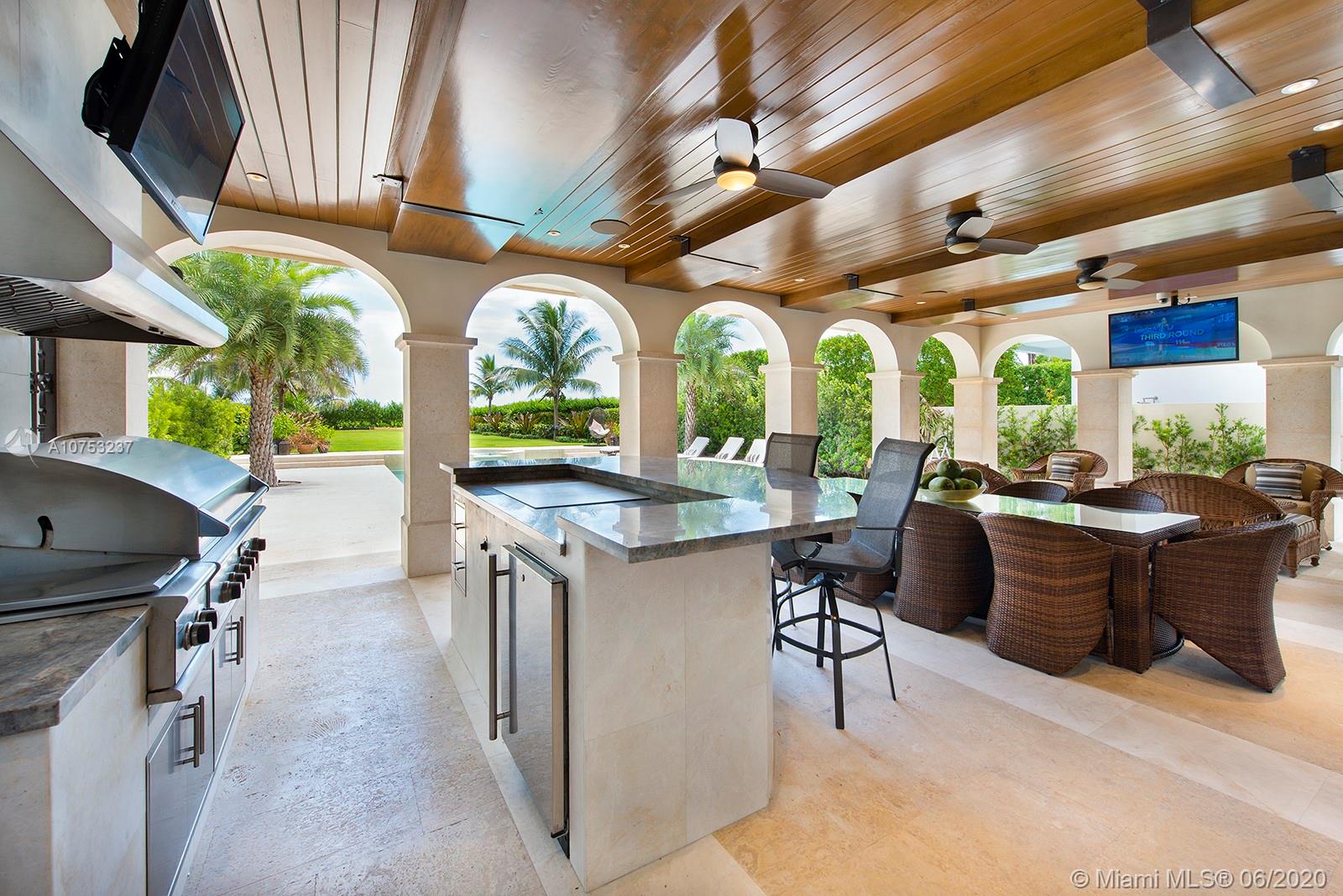 7825 Atlantic Way Miami Beach, FL 33141 - Photo 15 of 38 a kitchen with lots of counter top space