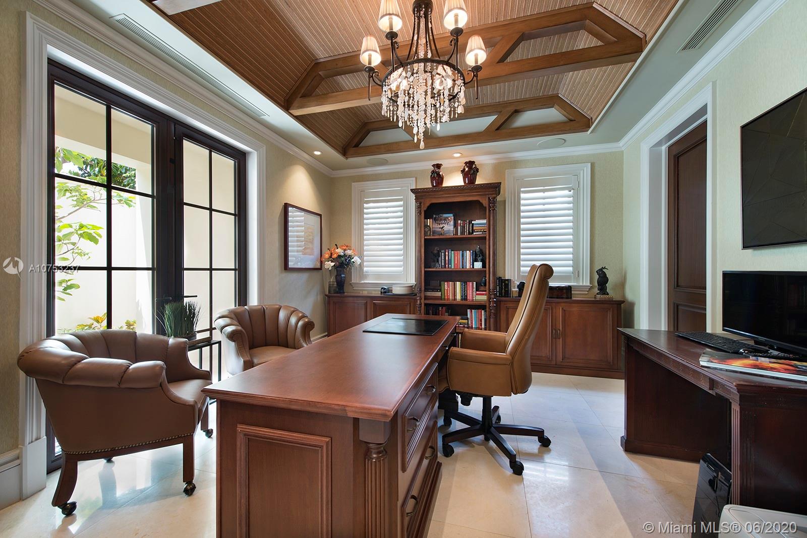 7825 Atlantic Way Miami Beach, FL 33141 - Photo 16 of 38 a view of a livingroom with workspace and a window