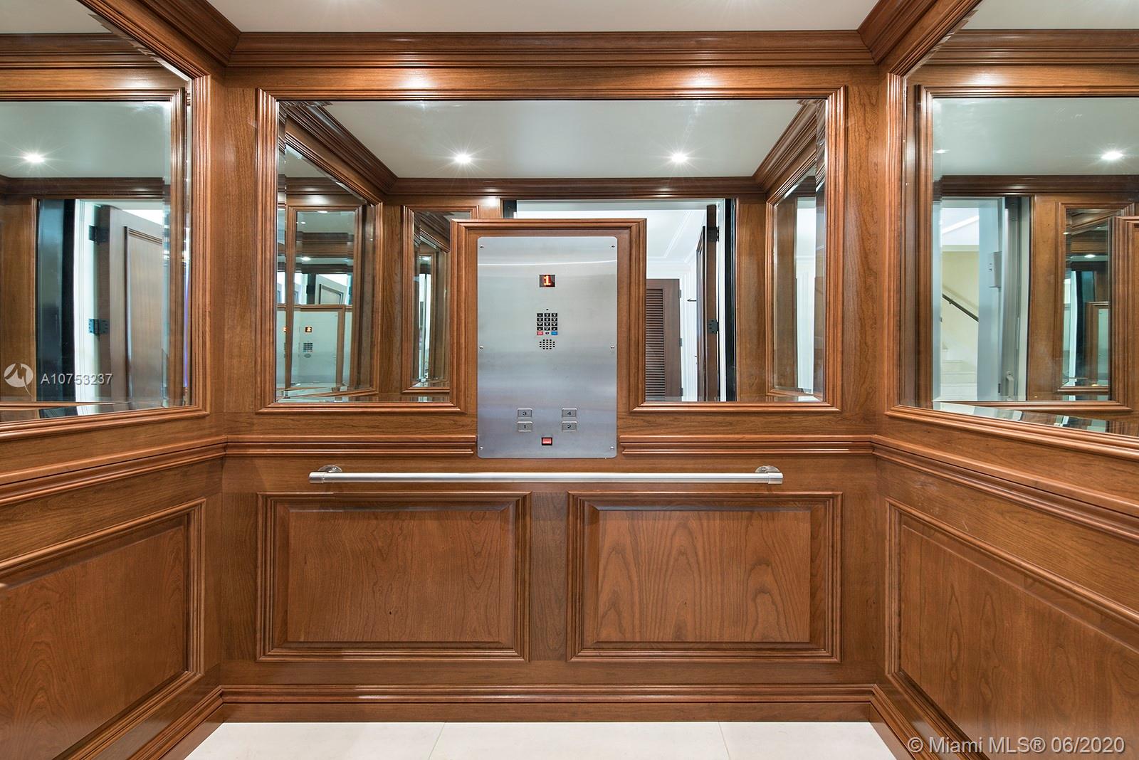 7825 Atlantic Way Miami Beach, FL 33141 - Photo 17 of 38 a view of a brick house with windows