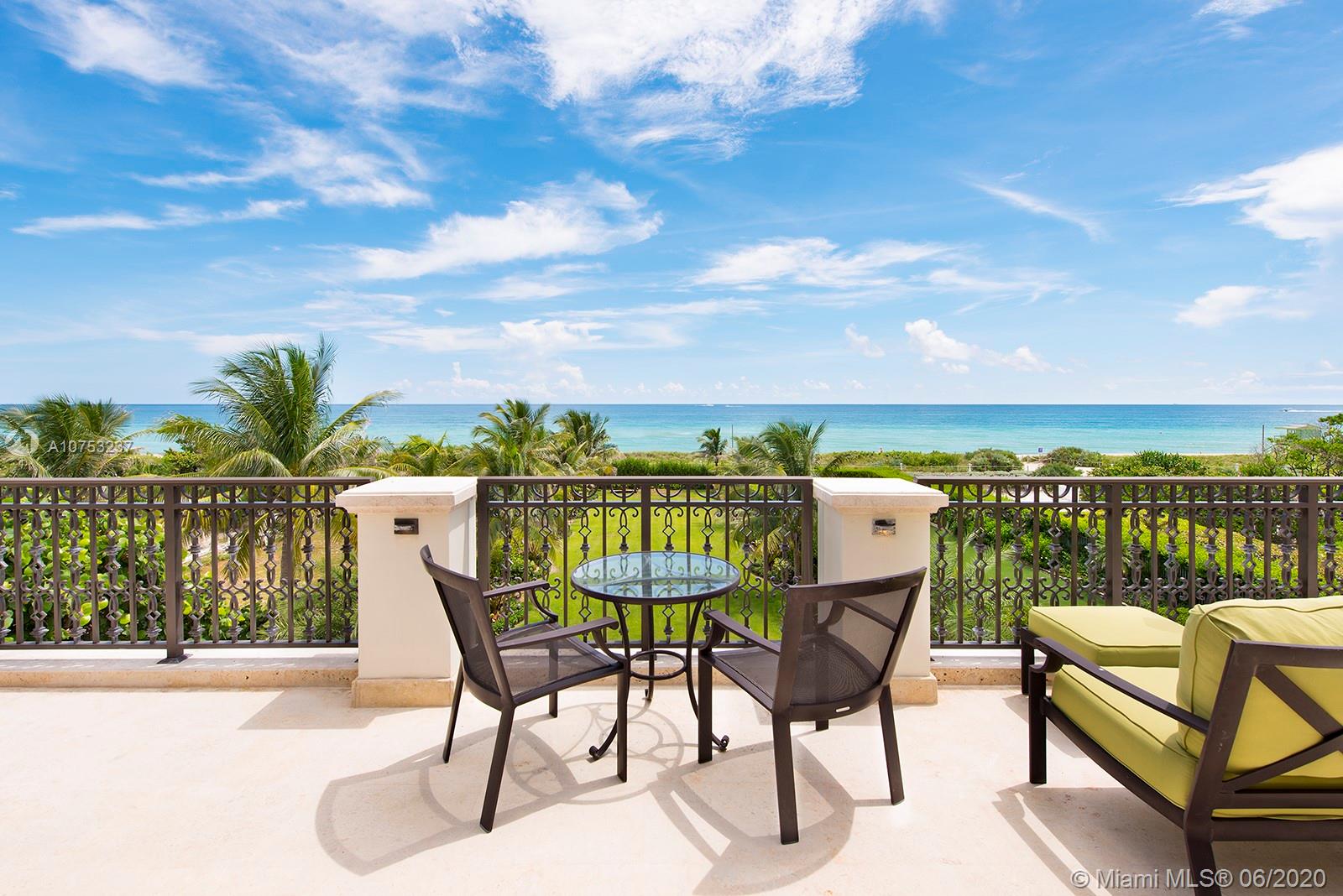 7825 Atlantic Way Miami Beach, FL 33141 - Photo 38 of 38 a balcony with furniture and city view