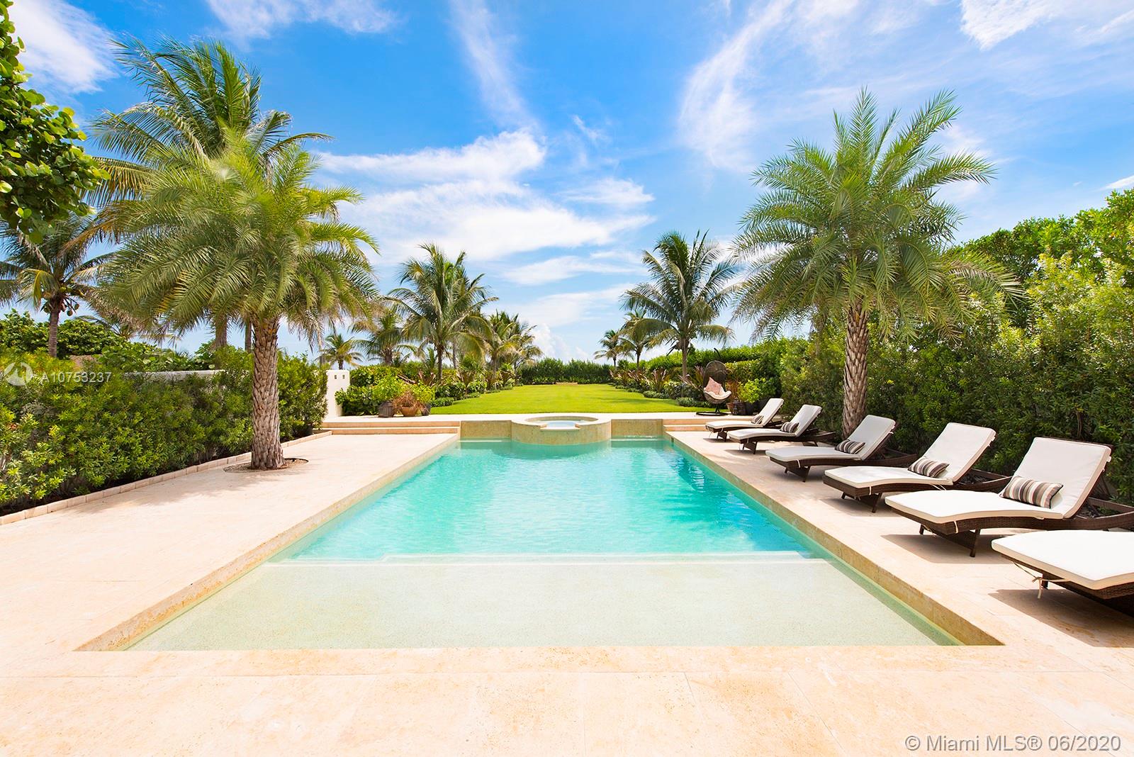7825 Atlantic Way Miami Beach, FL 33141 - Photo 4 of 38 a view of swimming pool with chairs