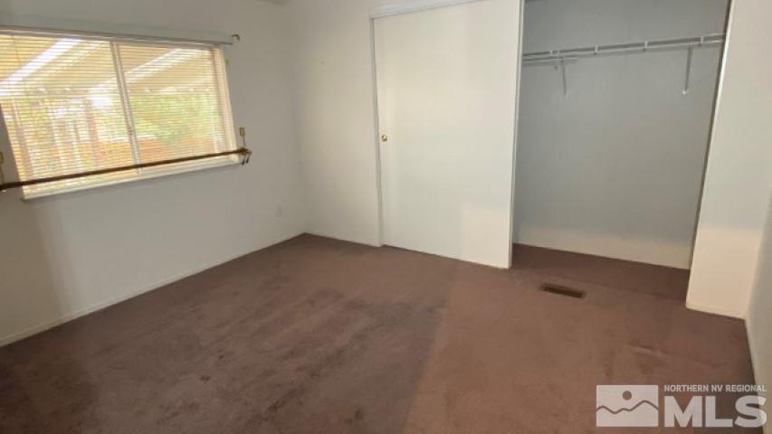 110 Taurus Circle Reno, NV 89521 - Photo 11 of 15 an empty room with a window