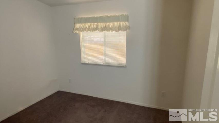 110 Taurus Circle Reno, NV 89521 - Photo 10 of 15 an empty room with a window