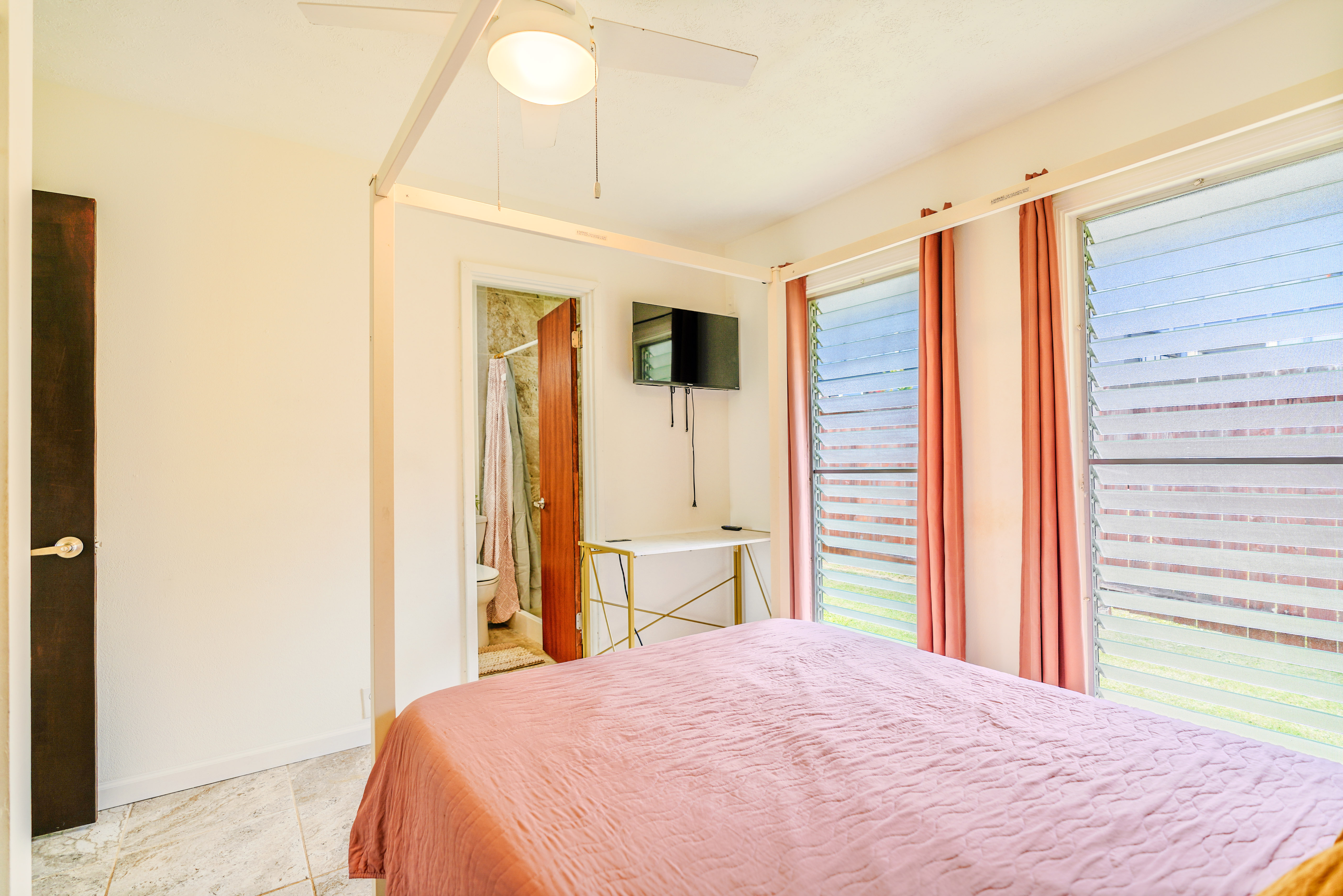 316 A Makani Road, Unit A Kapaa, HI 96746 - Photo 15 of 29 a bedroom with a bed and a dresser