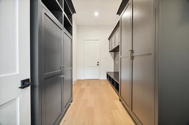 a view of hallway with stainless steel appliances