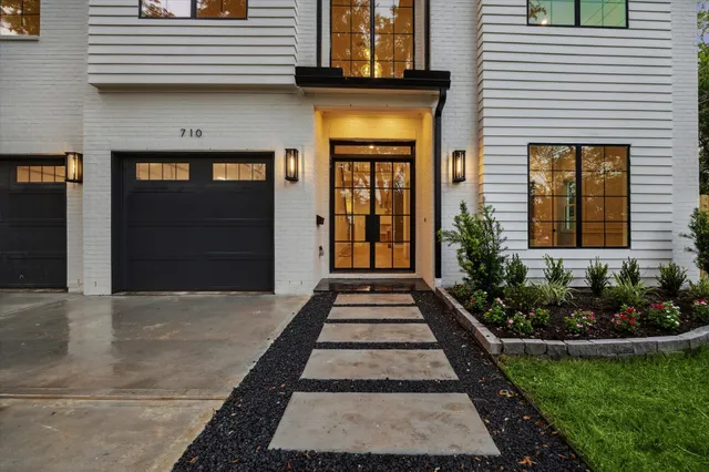 a front view of a house having yard
