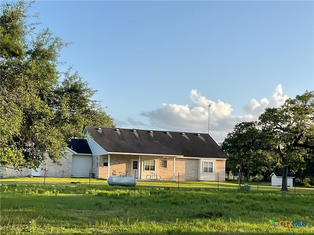 2826 Cattle Guard Road Cuero, TX 77954 - Photo 12 of 33 front view of house with a yard