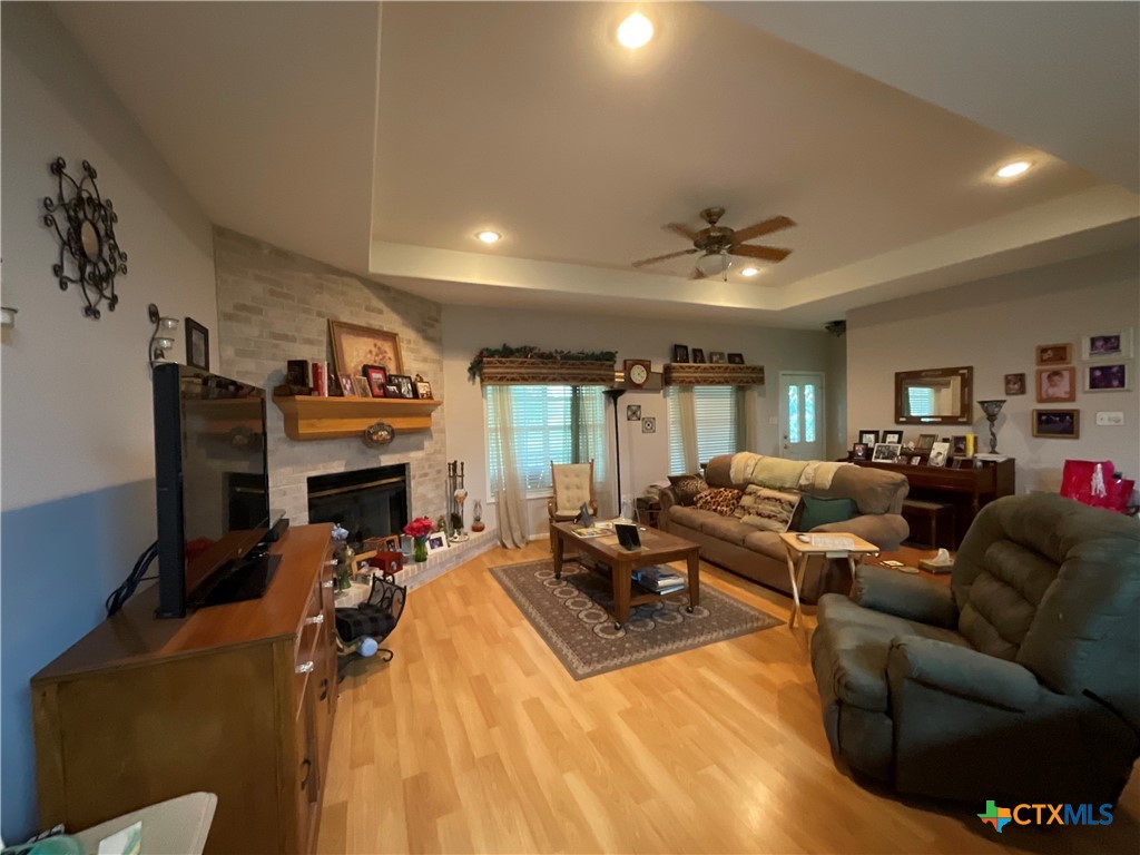 2826 Cattle Guard Road Cuero, TX 77954 - Photo 17 of 33 a living room with furniture fireplace and a window