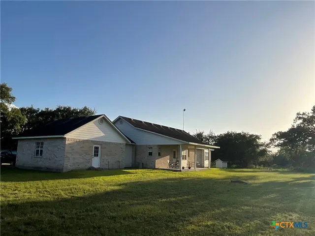 a garden view with a fountain