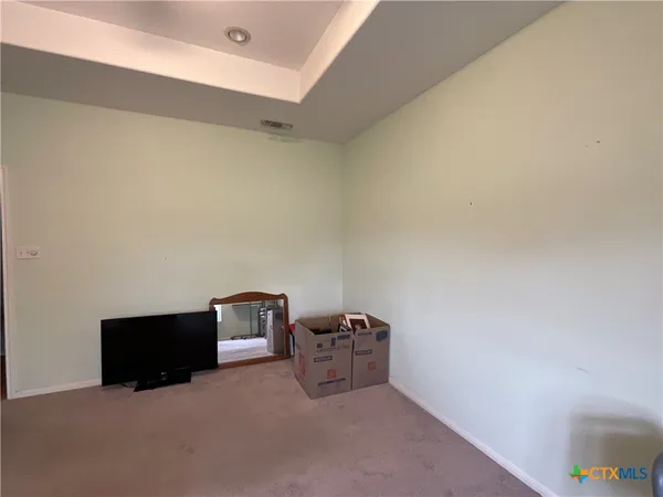 a view of a room with a window