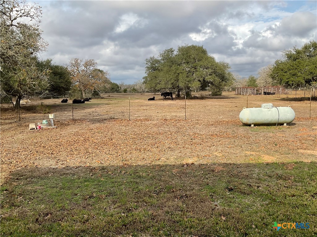 2826 Cattle Guard Road Cuero, TX 77954 - Photo 37 of 48 a view of a lake with a yard