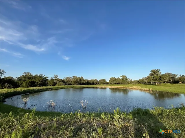a view of a lake with houses