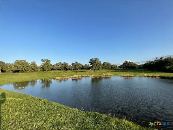 a view of a lake with houses