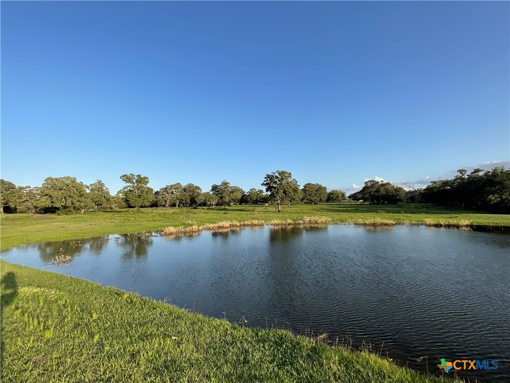 2826 Cattle Guard Road Cuero, TX 77954 - Photo 8 of 33 a view of a lake with houses