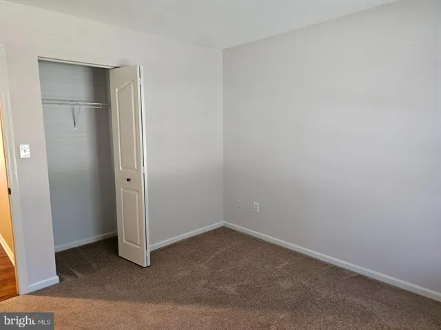 an empty room with closet