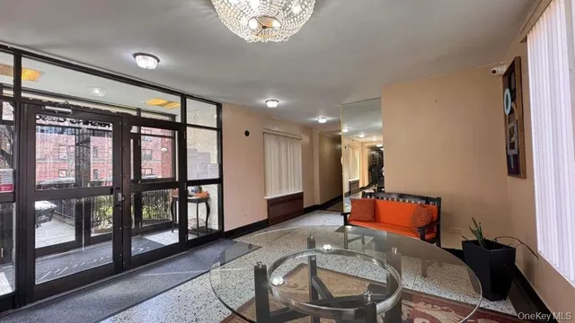 a room with furniture and a window