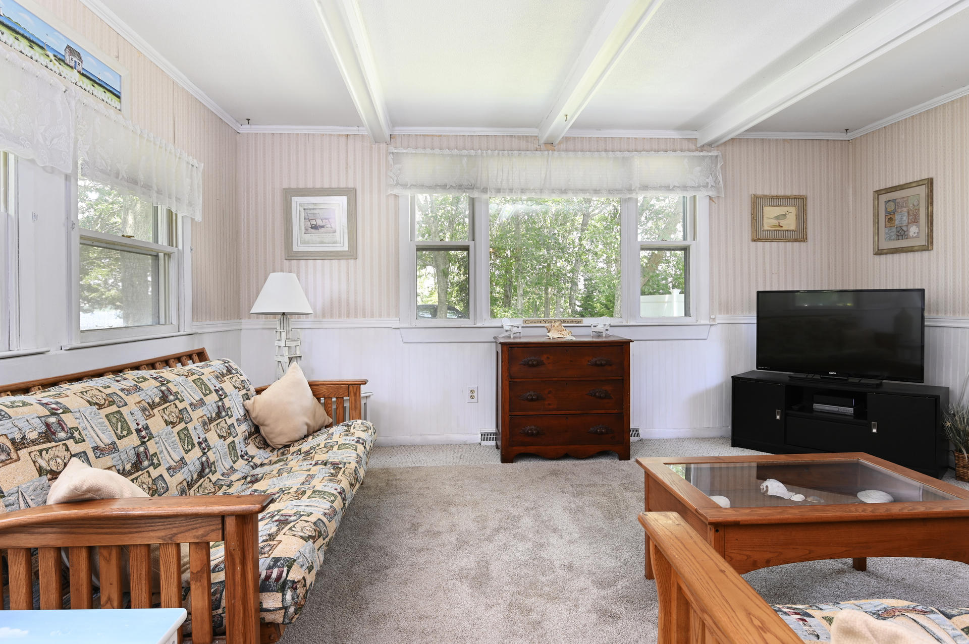 17 Child's Road Mashpee, MA 02649 - Photo 8 of 28 a living room with furniture and a flat screen tv
