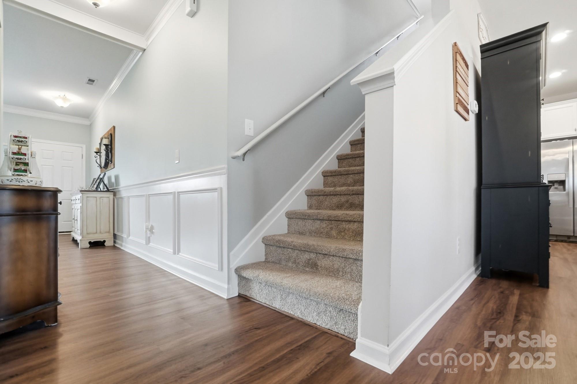 5033 Haven Lodge Road Matthews, NC 28104 - Photo 19 of 37 a view of entryway with wooden floor