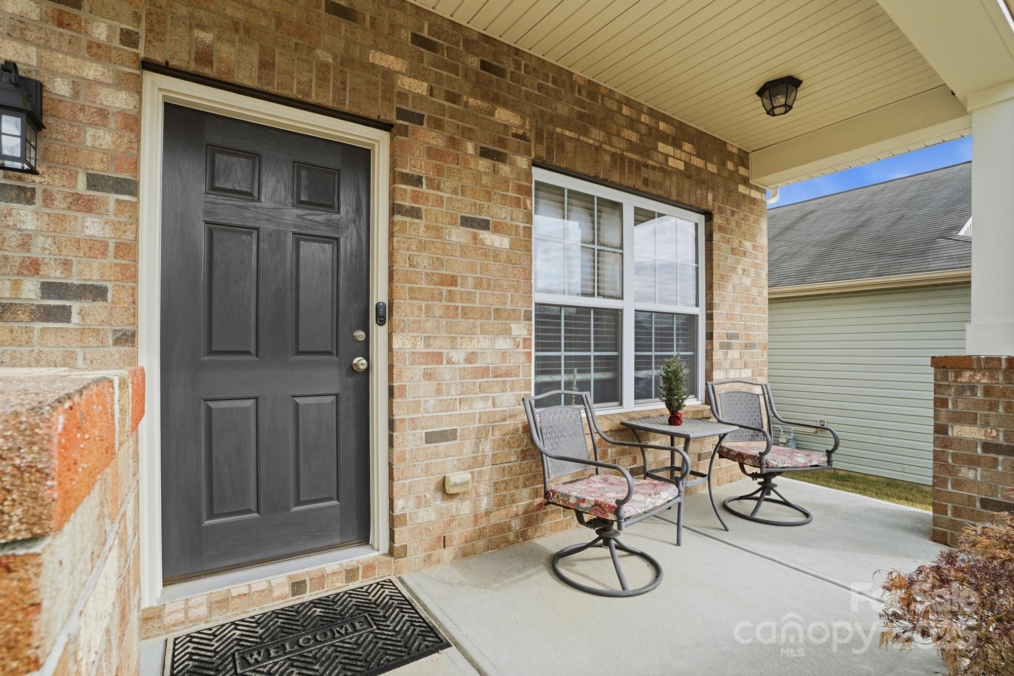 5033 Haven Lodge Road Matthews, NC 28104 - Photo 4 of 37 a view of entryway with livingroom and furniture