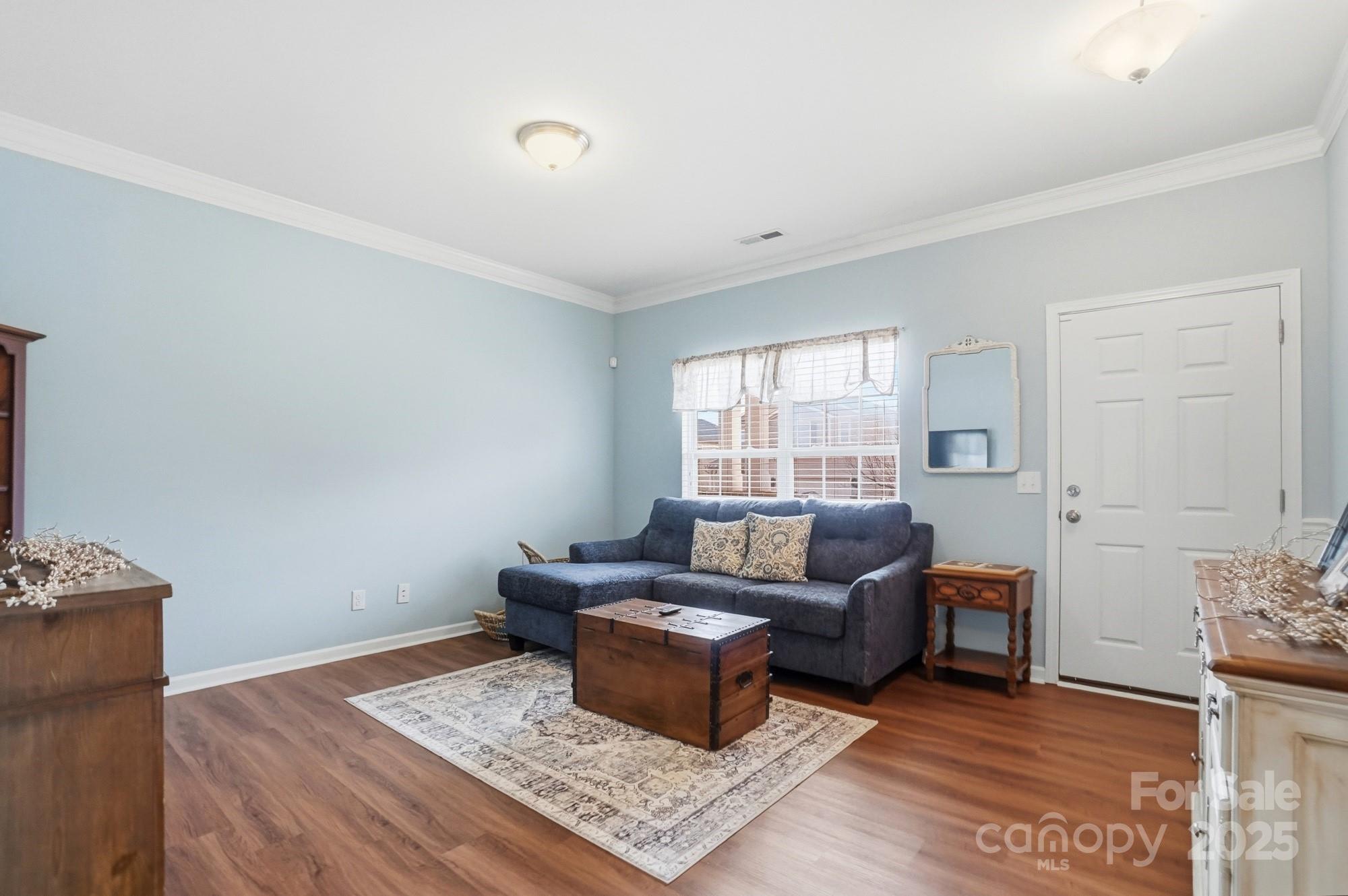 5033 Haven Lodge Road Matthews, NC 28104 - Photo 5 of 37 a living room with furniture and a window
