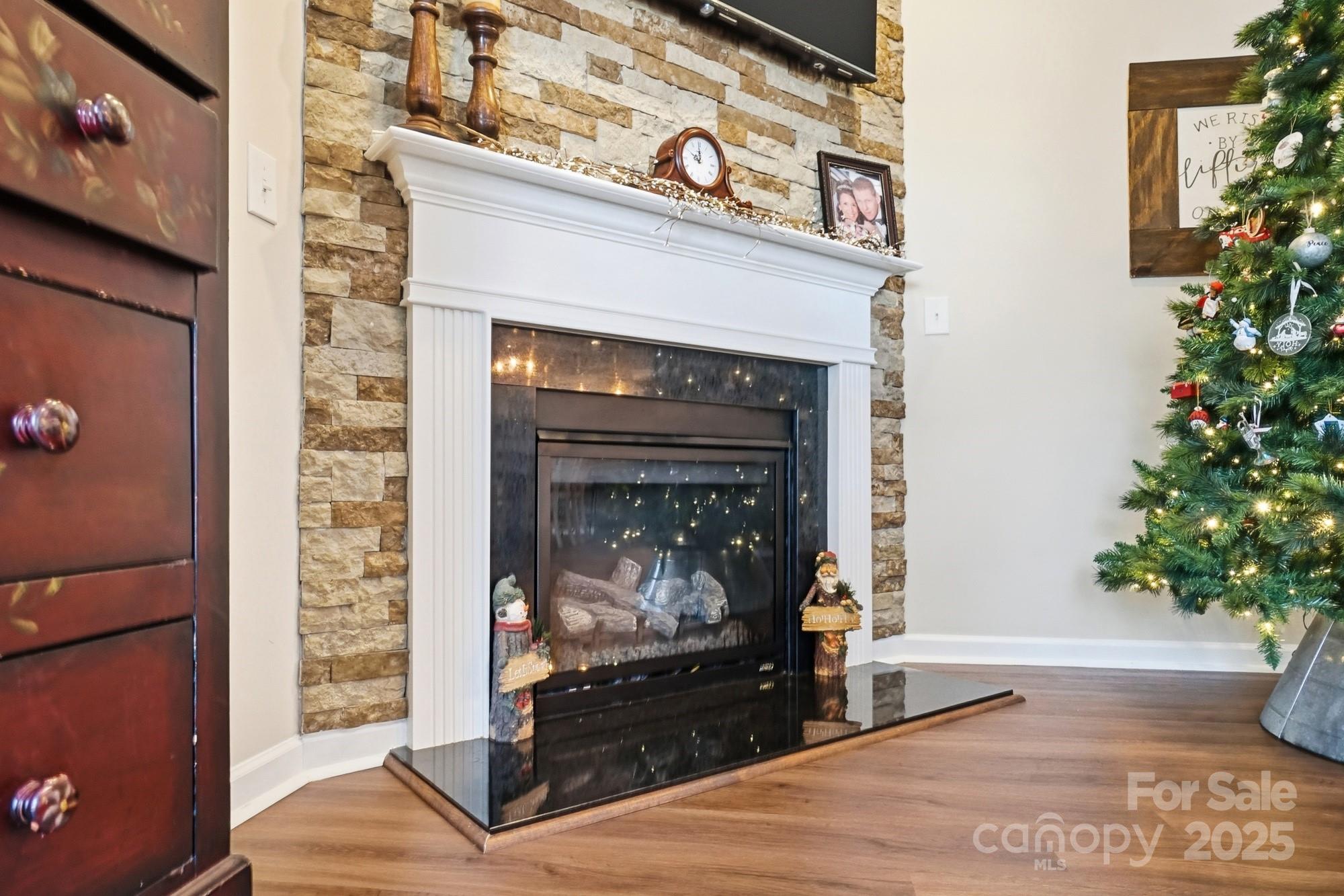 5033 Haven Lodge Road Matthews, NC 28104 - Photo 10 of 37 a living room with a fireplace