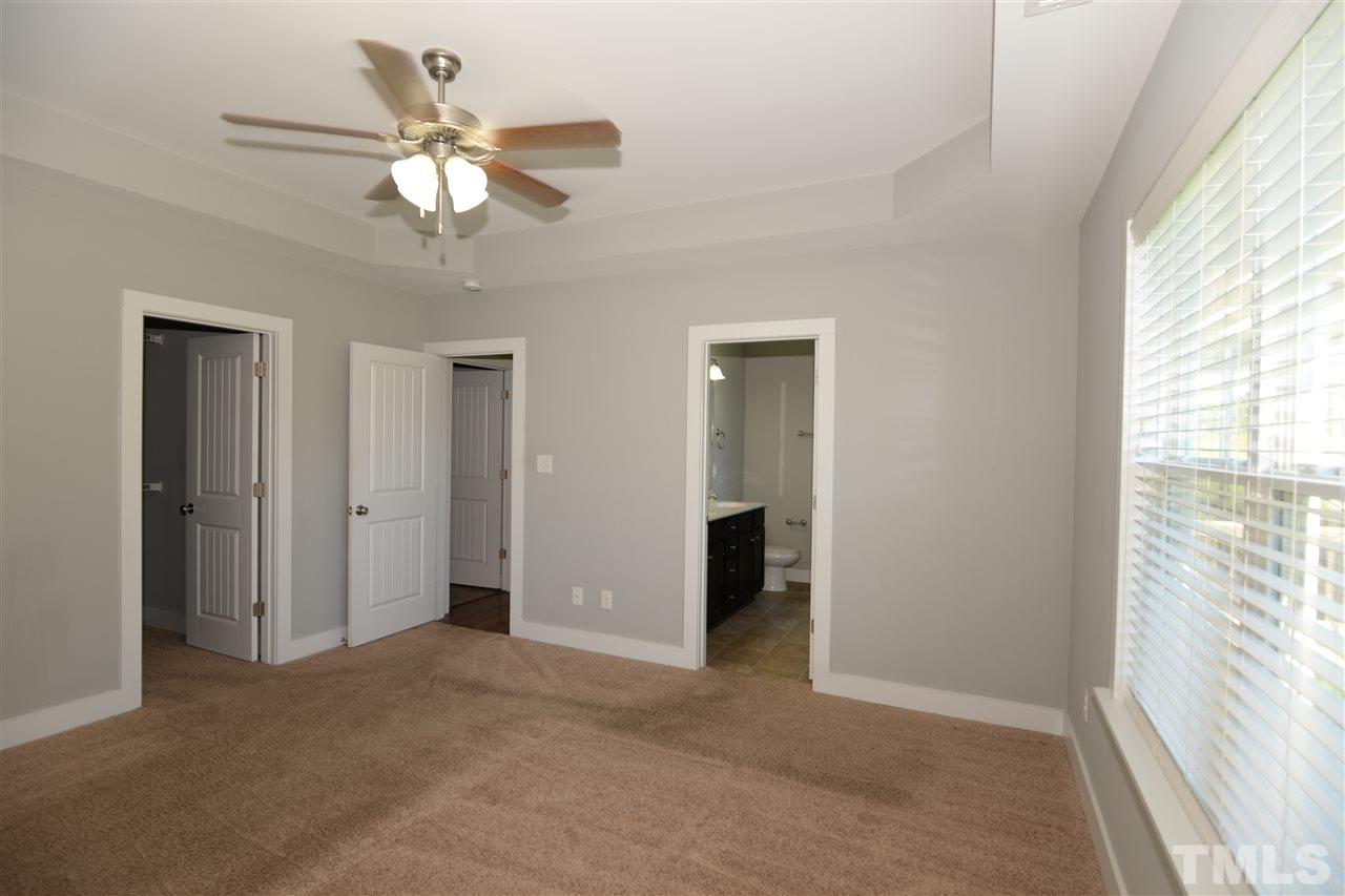 179 Red Wood Road Zebulon, NC 27597 - Photo 16 of 25 a view of an empty room with a window