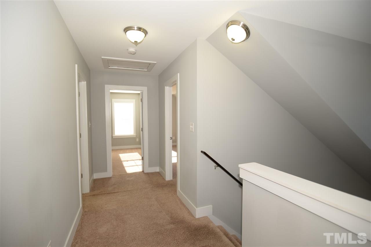 179 Red Wood Road Zebulon, NC 27597 - Photo 19 of 25 a view of an empty room with a bathroom